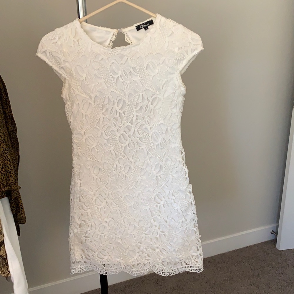 White lace dress with cutout back
